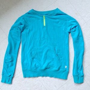 This is an Ivivva sweater that fits really nicely and moves with you!